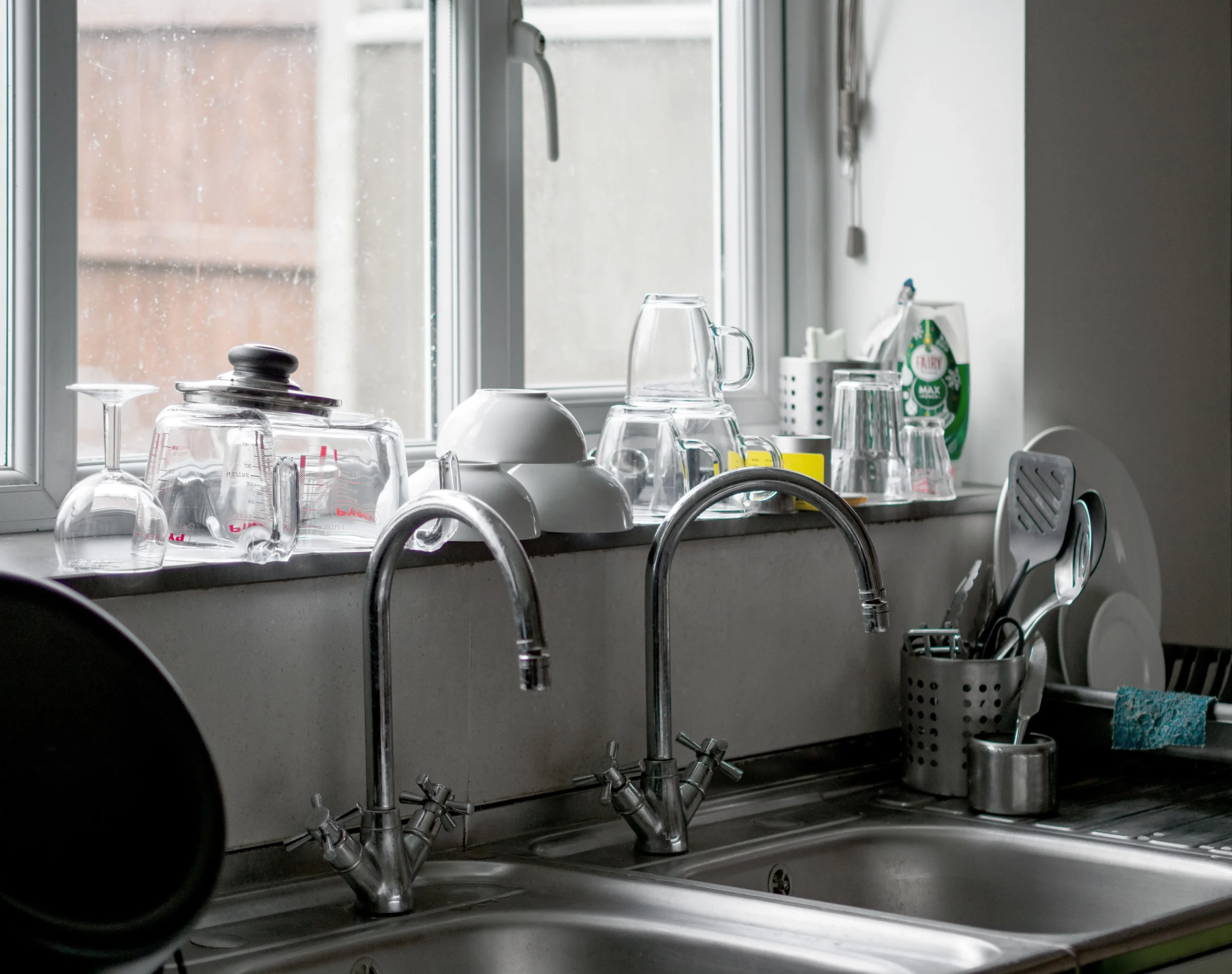 Pull-Down vs. Pull-Out Kitchen Faucets